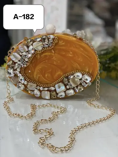 SIBY Saljut Orange Marble Effect Resin Handbags – Shop Now